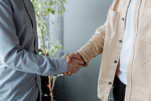 Two%20professionals%20shaking%20hands%20%282%29